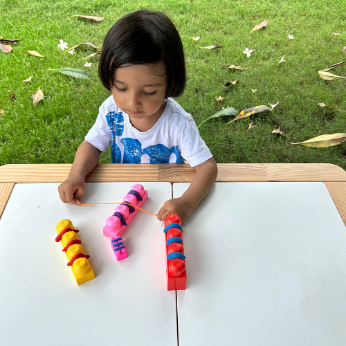 Flossing Practice With Lego Blocks